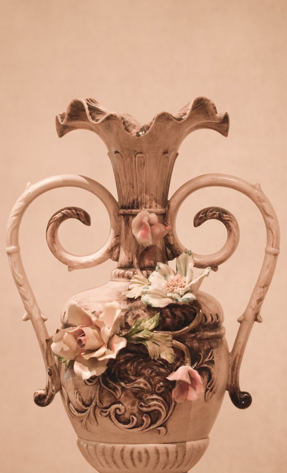 A round terracotta planter with a low foot.